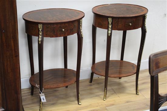A pair of Louis XVI style oval two tier occasional tables, W.45cm